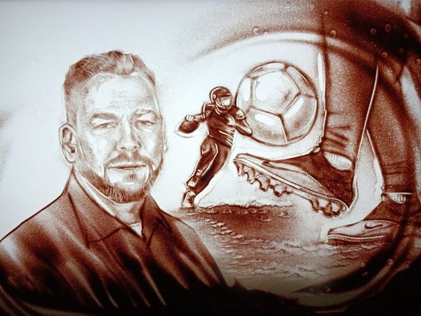 Detailreiches Sandporträt von Allianz AG Mitarbeiter, live erstellt von den Sandartisten.