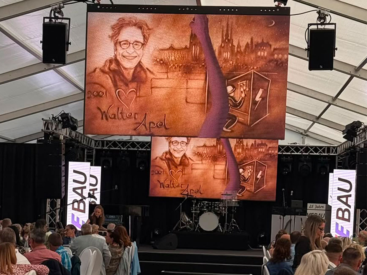 Sand Art als visuelle Reise durch 25 Jahre VEBAU
